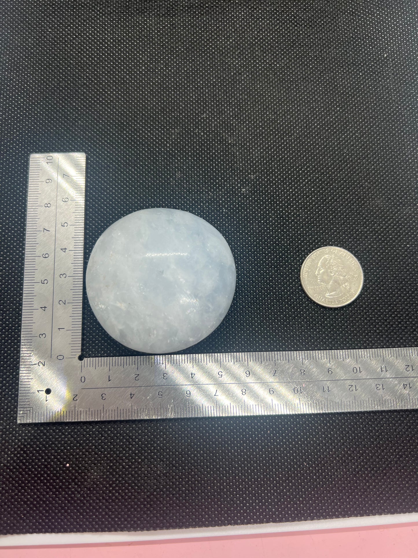 Light blue calcite palm stone- small